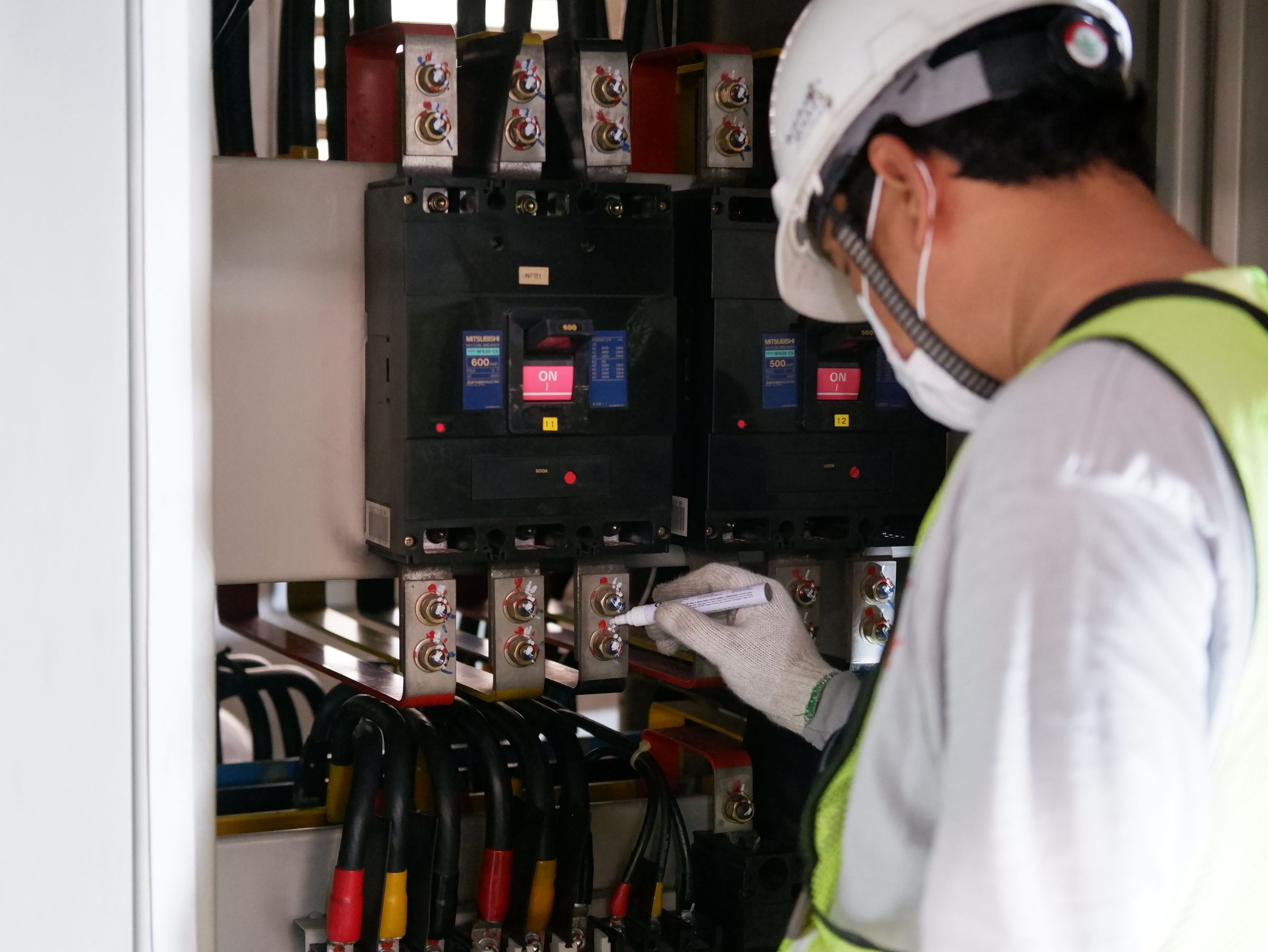 Megawin engineer testing a medium voltage circuit breaker